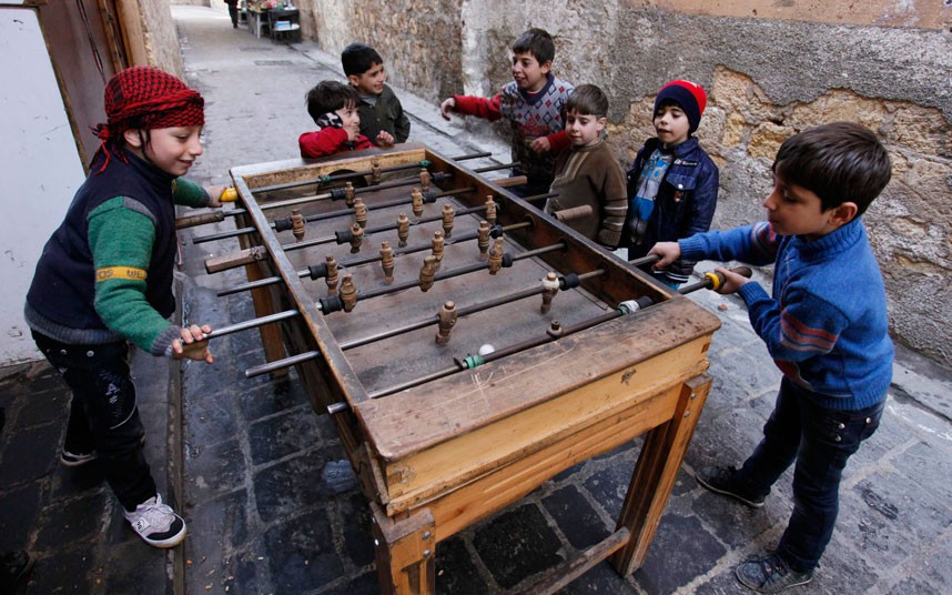 Children play in old Aleppo. (Reuters/Molhem Barakat)