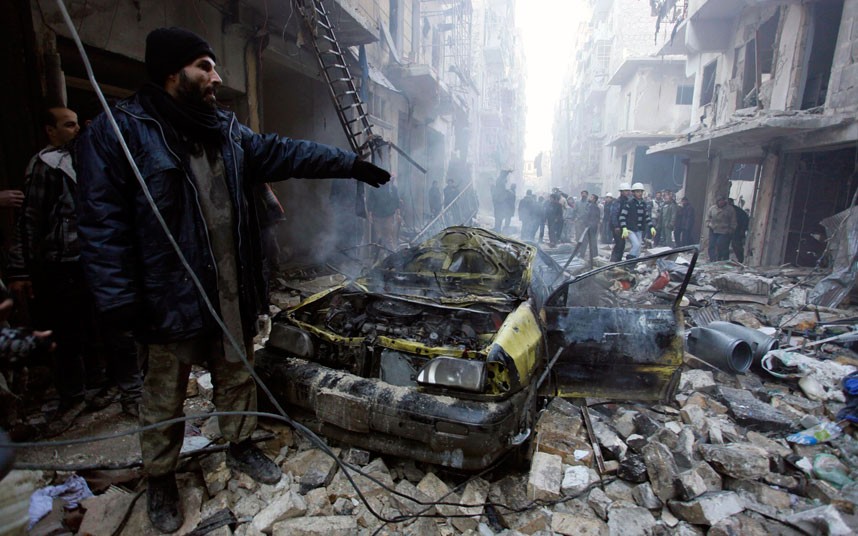 The remains of what activists say was an air strike by forces loyal to Assad's regime. (Reuters/Molhem Barakat)