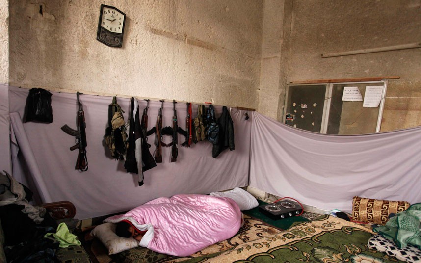 A Free Syrian Army fighter rests in Aleppo. (Reuters/Molhem Barakat)