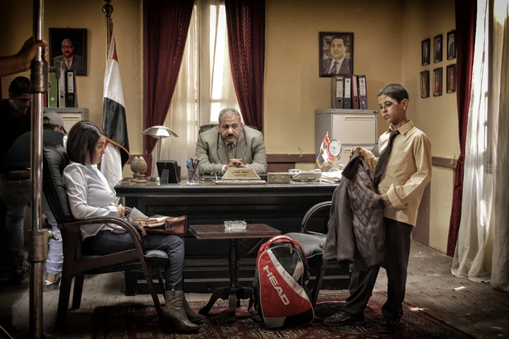 Mother (Kinda Aloush) and lead actor Hany (Ahmed El Dash) at the principal's office following a fight. Courtesy of Aly El Banna.