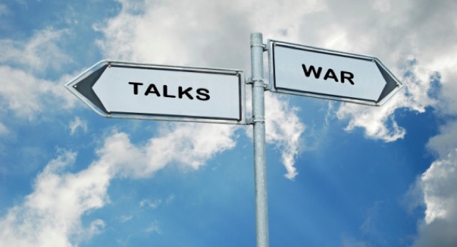 Road signs to war and talks