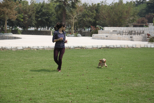 Tara Emad and her dog Frisky at Mohamed Ali Club