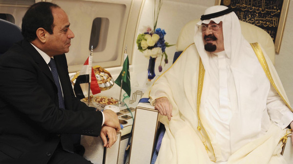 Saudi Arabia's King Abdullah meets Egypt's new president Abdel Fattah al-Sisi during his visit to Cairo
