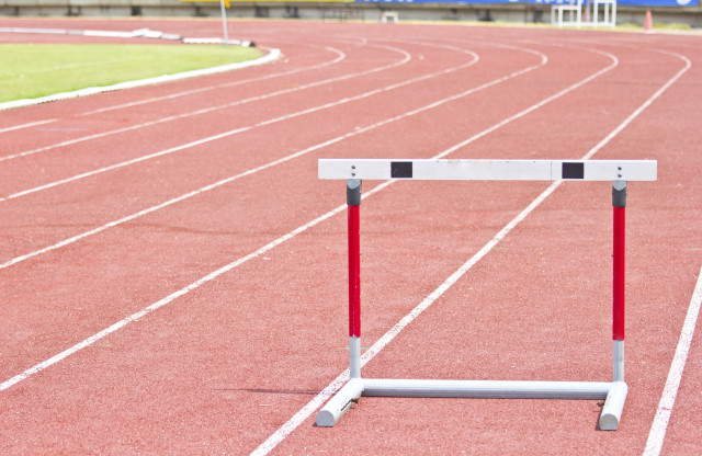 hurdles on the red running track