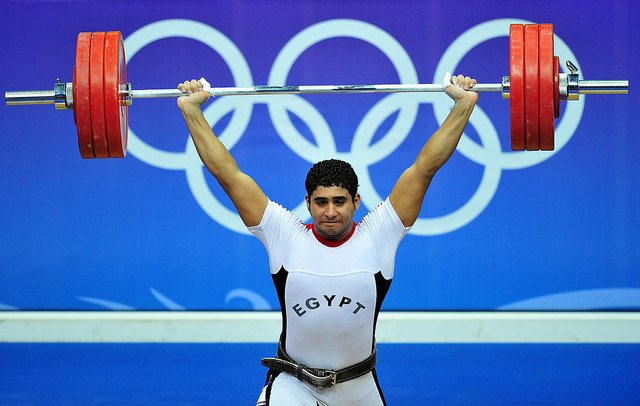 Hassan Mohamed of Egypt lifts in the Men's Over 85kg WeightliftingFinals of the Singapore 2010 Youth Olympic Games (YOG) at the Toa Payoh Sports Hall in Singapore, Aug 19, 2010. He lifted a total of 330kg to win a bronze medal. Photo: SPH-SYOGOC/Chia Ti Yan