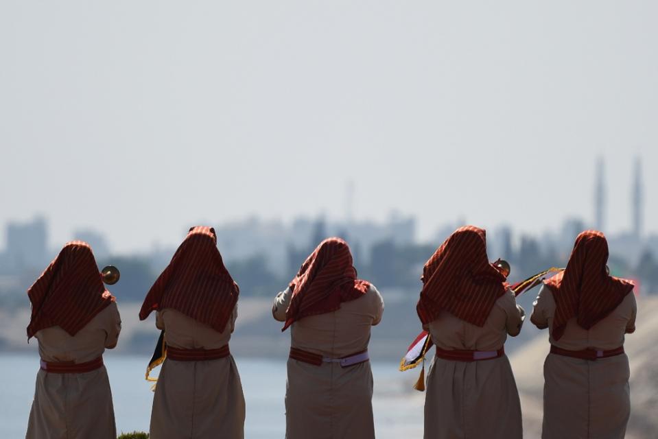 Performers dressed in Pharaonic costumes (AFP/Mohamed El Shahed)