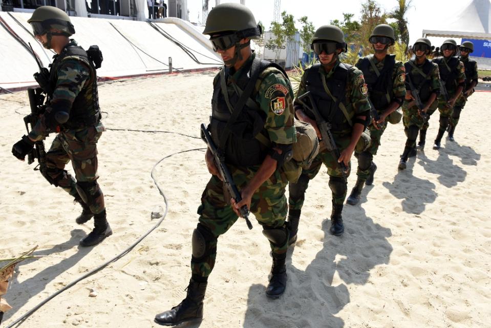 Soldiers patrolling the banks of the New Suez Canal in Ismailiya for the celebrations of the opening of the New Suez Canal (AFP/Mohamed El-Shahed)