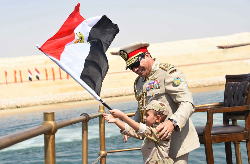 President Abdel Fatah El-Sisi was joined by a child with cancer for the celebrations of the opening of the New Suez Canal (Egyptian Presidency/Handout)