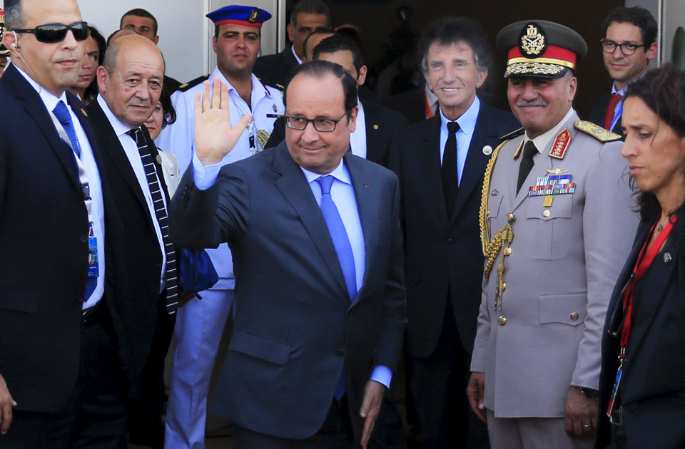 French President Francois Hollande arriving to the celebrations of the opening of the New Suez Canal (Reuters)