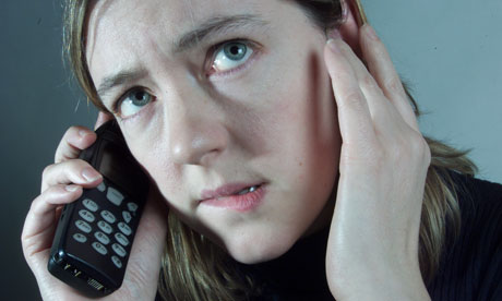worried woman on phone