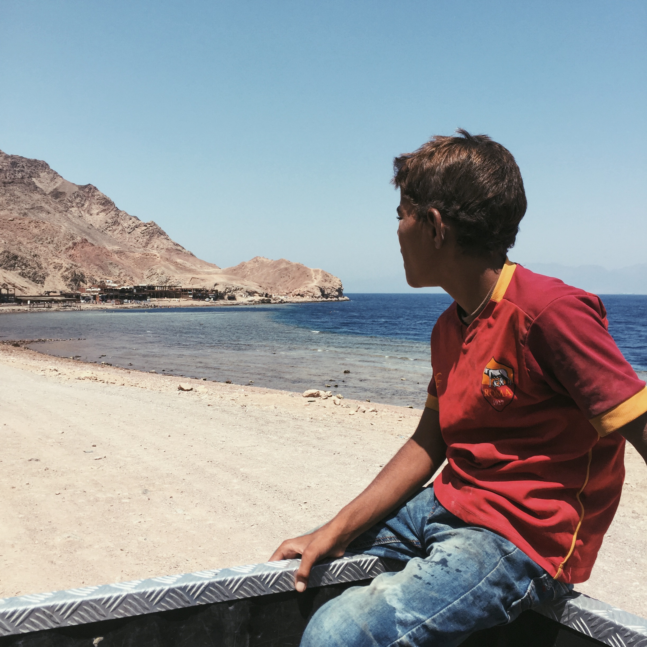 Mohamed on the back of a truck (which also means taxi in Dahab) on our back to town from Blue Hole