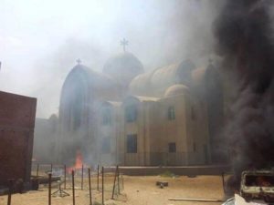 As Egypt witnesses a rise of severe sectarian violence, President Al-Sisi promises Christians to make it up to them and replace all the Churches that were set ablaze. Photo taken in Fayyoum, 2013. Via Egyptian Streets.