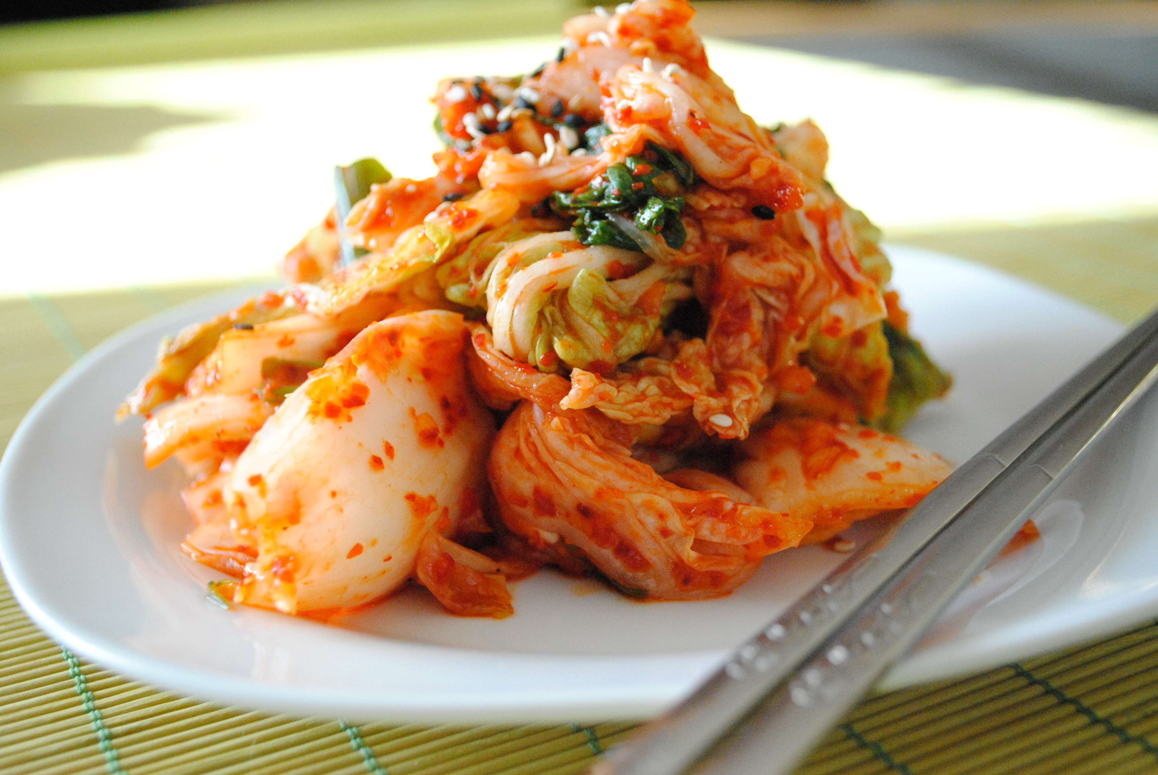 Kimchi is a traditional fermented Korean side dish made of vegetables with a variety of seasonings. Via Korean Food Gallery.