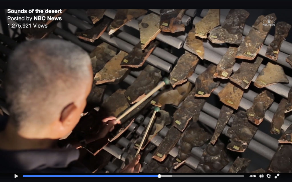 Ammar Khammesh playing his 'Sound of the Desert' exhibit at Amman Design Week (screencap from 'Sound of the Desert')