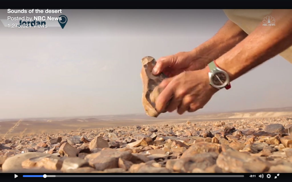 Ammar Khammesh tests flint stones in the Jordanian desert (screencap from 'Sound of the Desert')