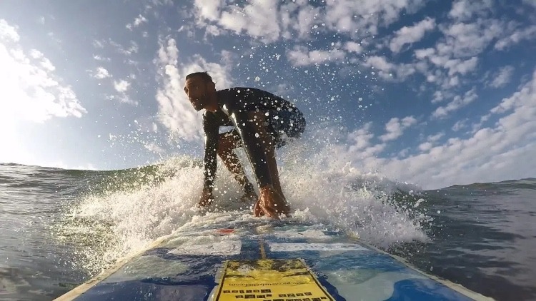 Celebrating International Surfing Day: 5 Best Spots in the Middle East To Catch Some Waves