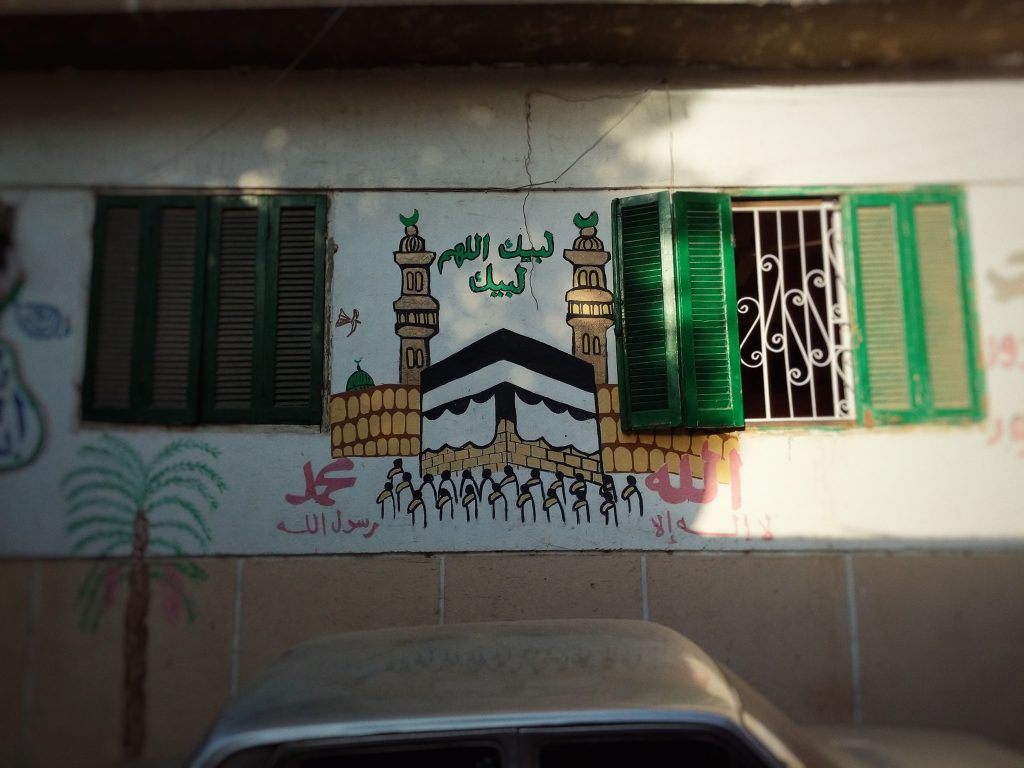 Hand-painted hajj mural in Cairo. Hajj house painting.