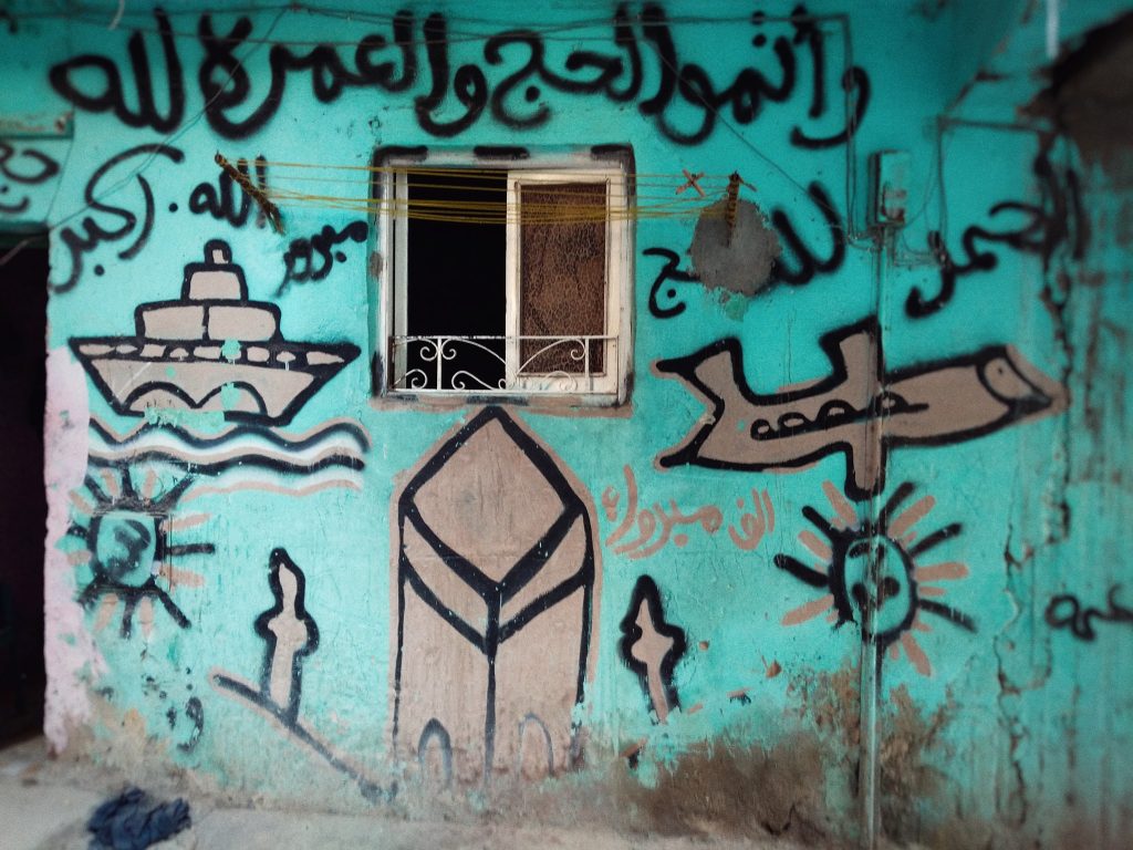 Hand-painted hajj mural in Cairo. Hajj house painting.